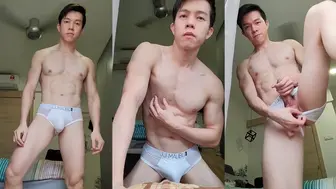 Chinese muscular guy masturbating