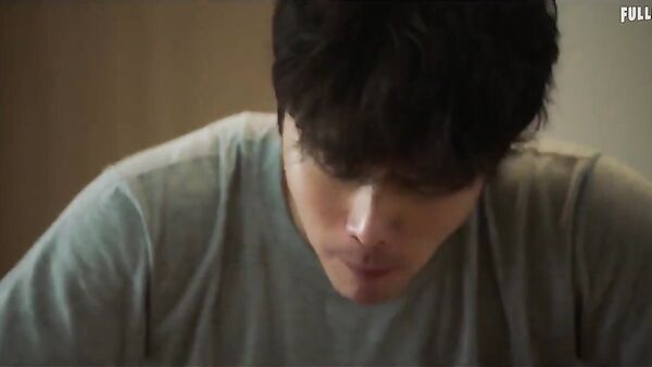 Korean guy making love passionately with girl in house