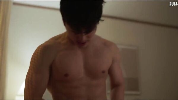 Korean guy making love passionately with girl in house