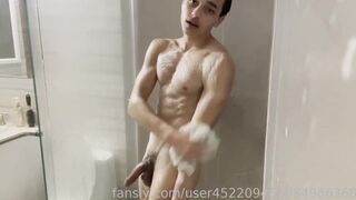 Jerking off in the shower and cumming over myself –
